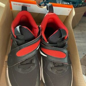 Red and Black Nike Athletic Shoes